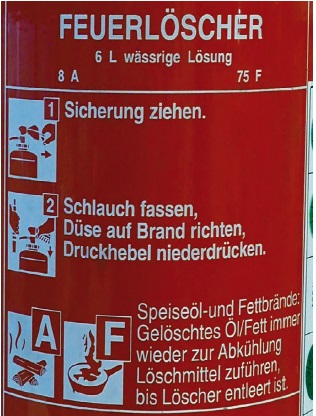 Abb. 10: Kennzeichnung eines Feuerlöschers mit Baujahr ab 2007 nach DIN EN 3 mit dem Piktogramm zur Brandklasse F